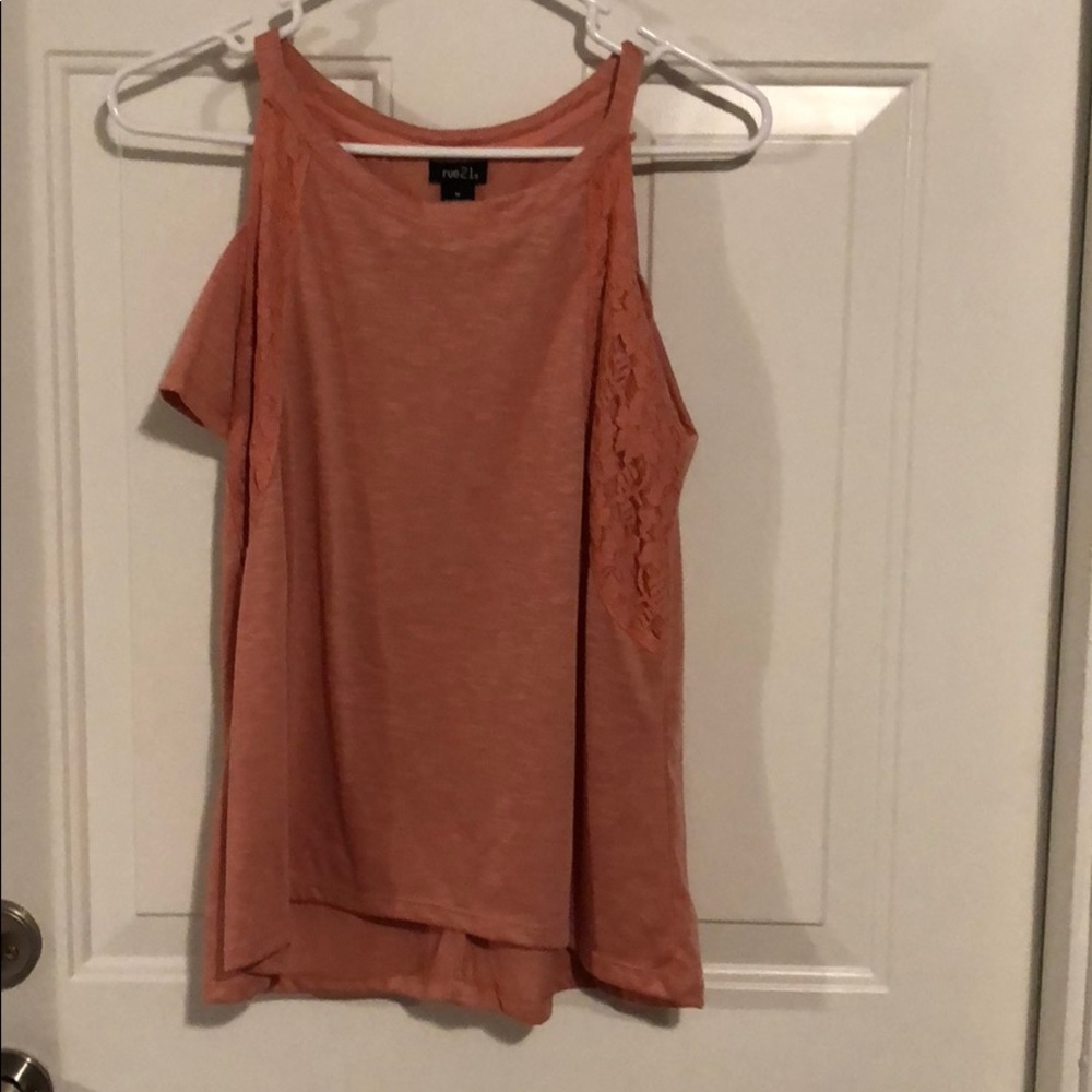 Pink shirt that shows shoulders